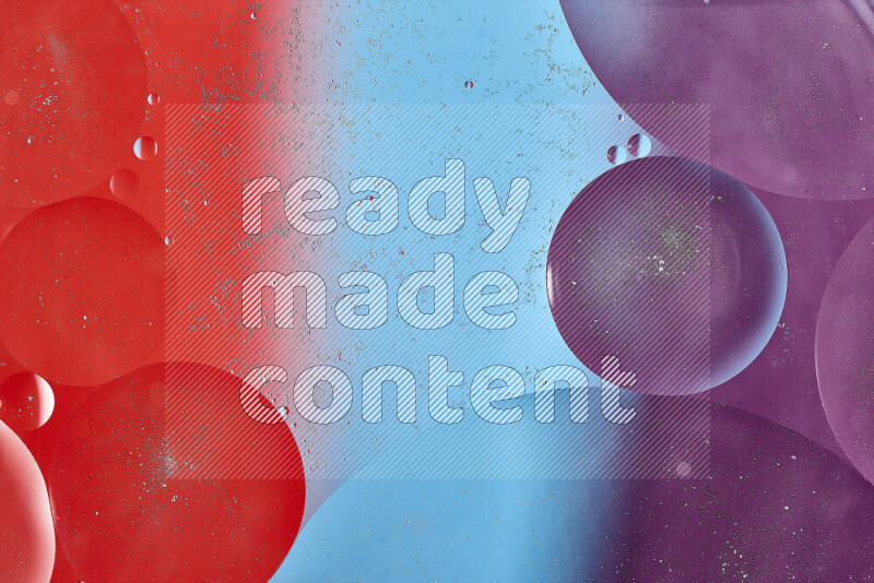 Close-ups of abstract oil bubbles on water surface in shades of blue, red and purple