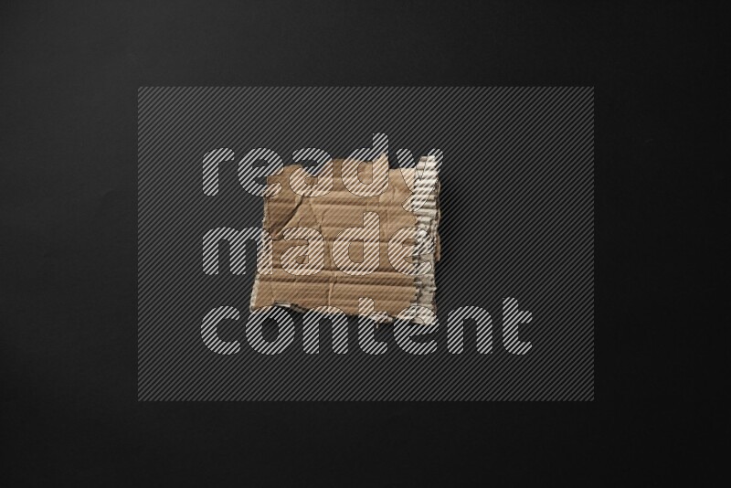 Cardboard on black background