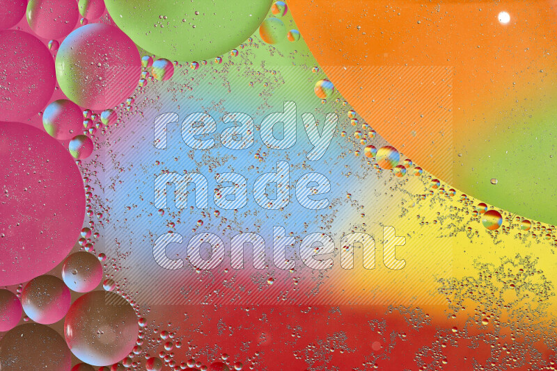 Close-ups of abstract oil bubbles on water surface in multicolors