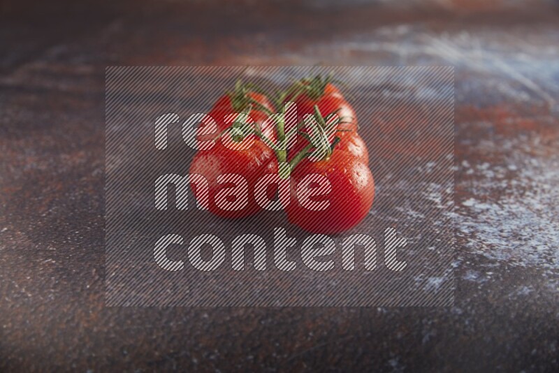 red cherry tomato vein on a reddish rustic metal background 45 degree