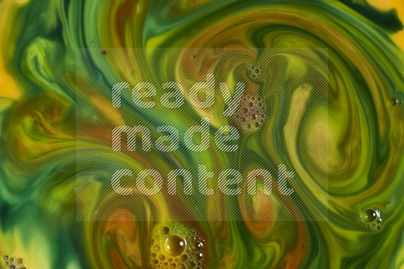 A close-up of abstract swirling patterns in orange, green and red