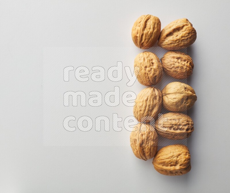 Top-view shot of walnut on white background