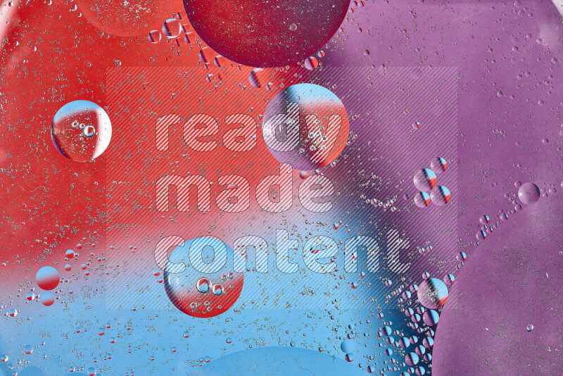 Close-ups of abstract oil bubbles on water surface in shades of blue, red and purple