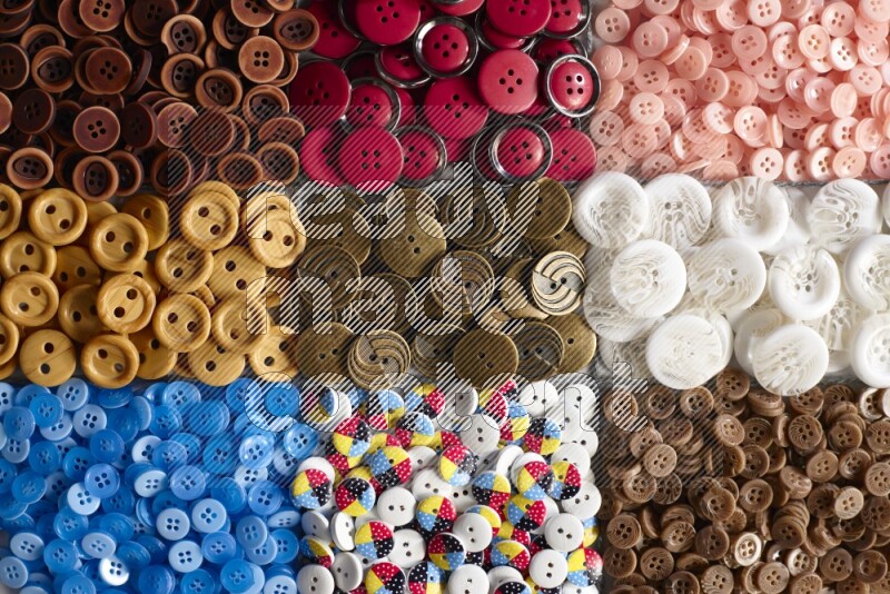 Multicolored buttons placed on grey background