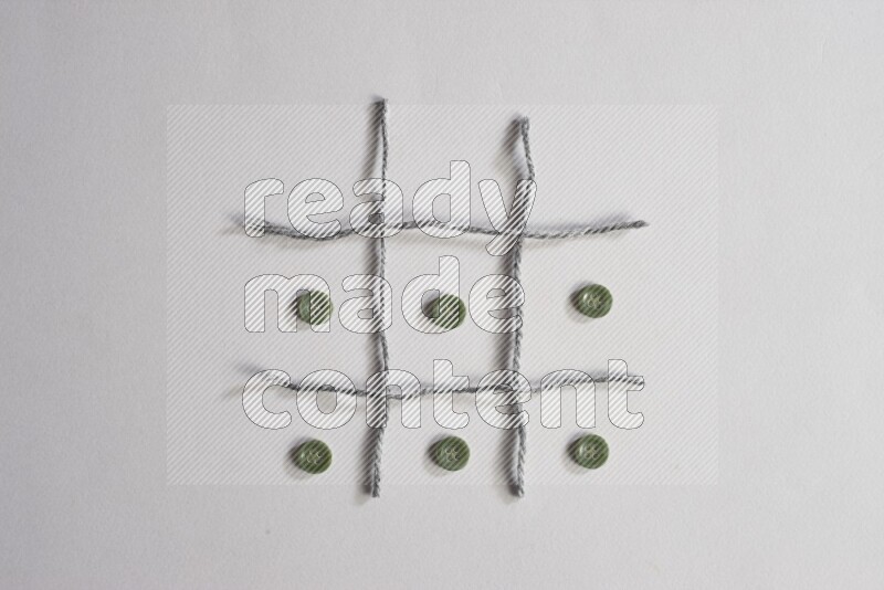 Green buttons placed on grey background