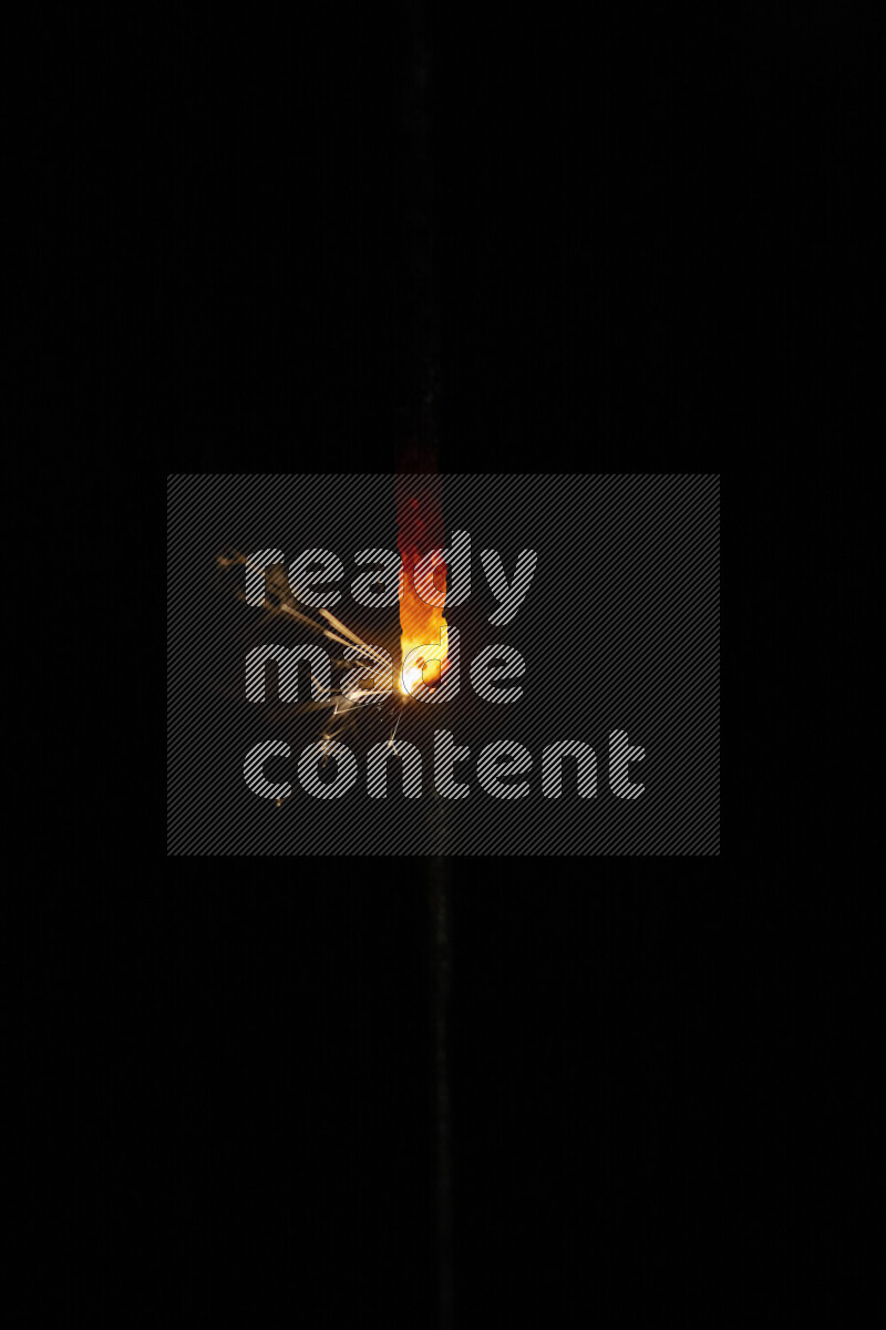 A close-up image of sparkler candle isolated on black background