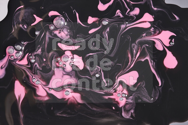 Abstract colorful background with mixed of pink and black paint colors