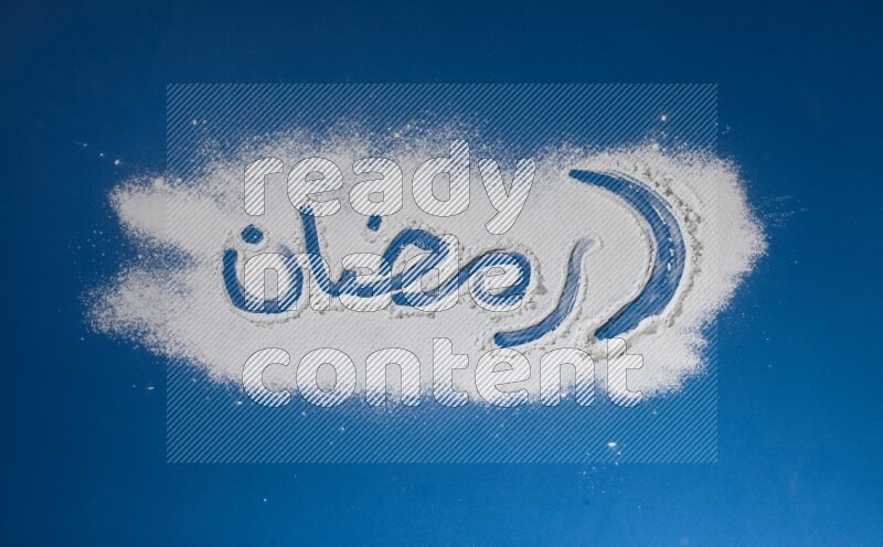 A word written with white powder on blue background
