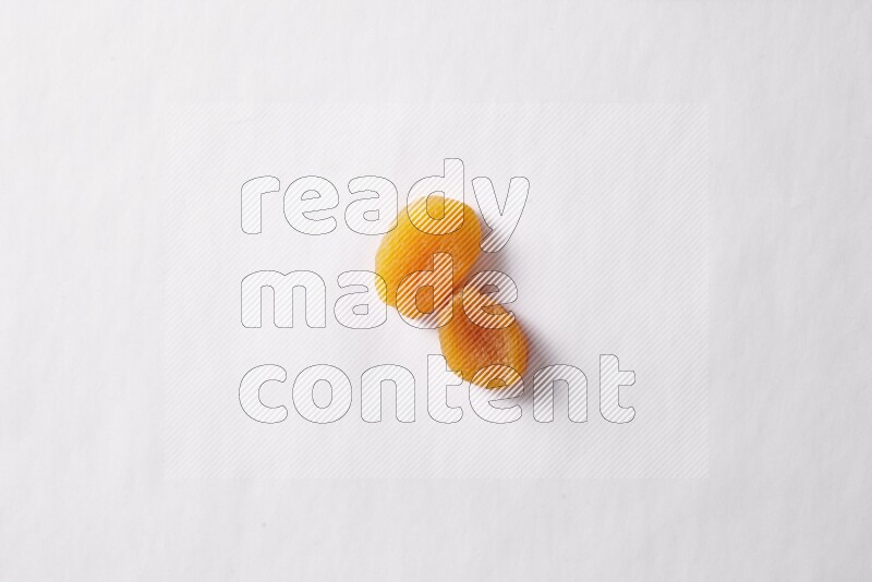 Dried apricots on white background
