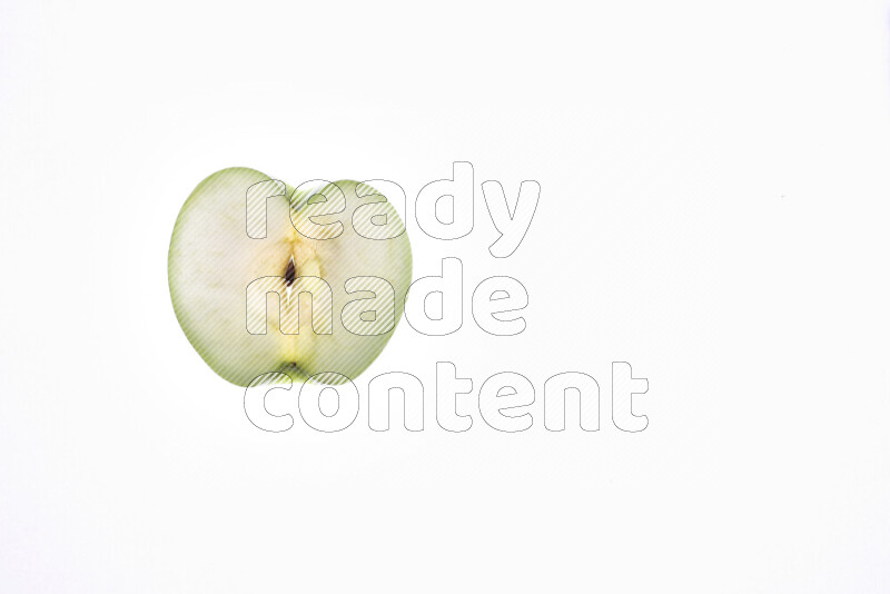 Apple slices on illuminated white background