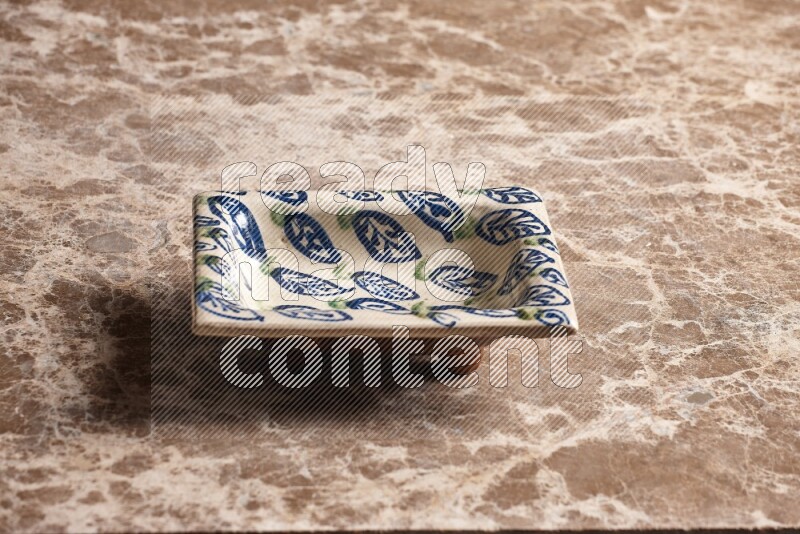 Decorative Pottery Plate on Beige Marble Flooring