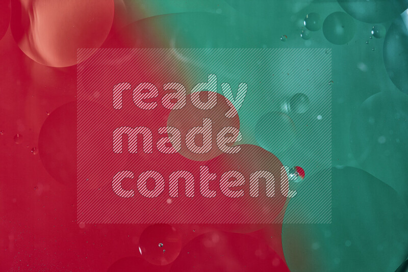 Close-ups of abstract oil bubbles on water surface in shades of green and red