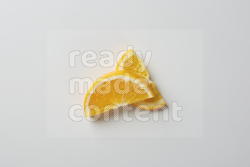 Two halves of an orange slices on white background