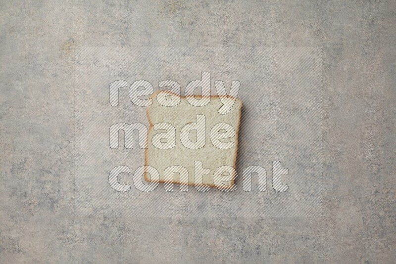 White Toast slices on alight blue textured background