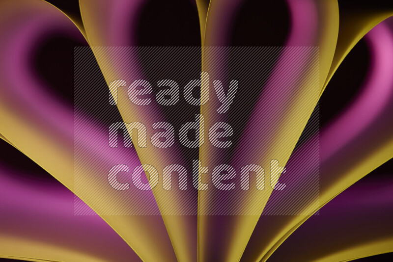 فن تجريدي يعرض منحنيات وتدرجات اللون الأصفر والوردي مكونه بضوء ملون