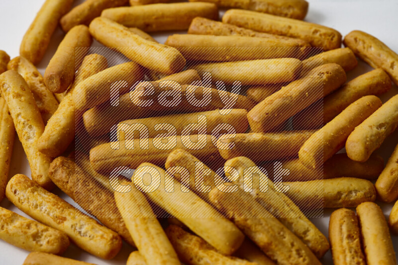 Assorted snacks on white background
