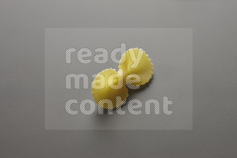 Fiocchi pasta on grey background