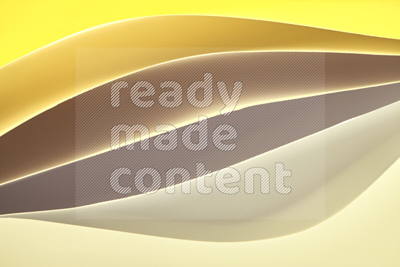 This image showcases an abstract paper art composition with paper curves in gold gradients created by colored light