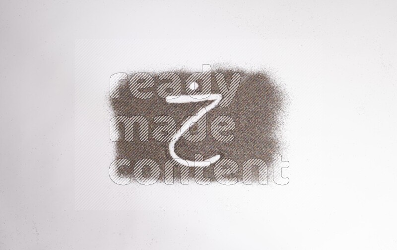 Arabic alphabets written with glitter on white background