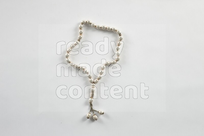 A prayer beads placed on white background