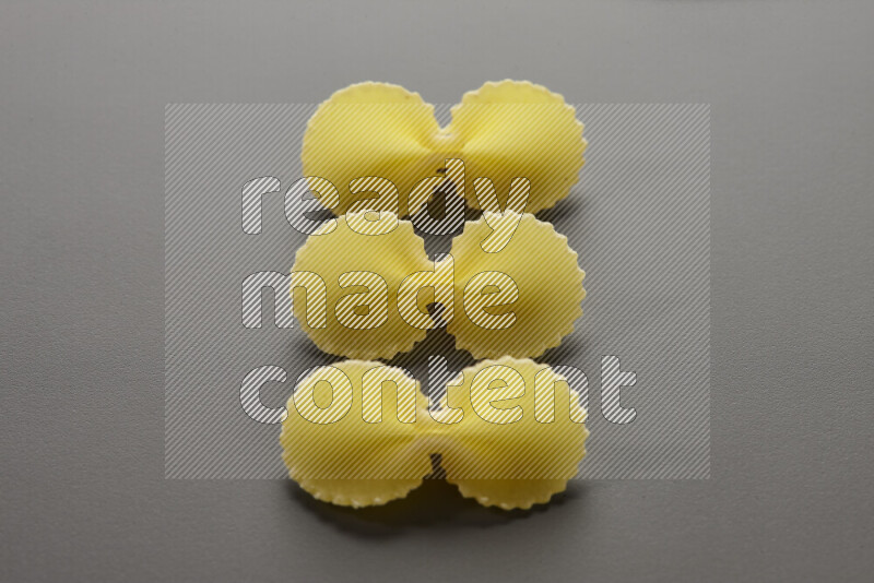 Fiocchi pasta on grey background