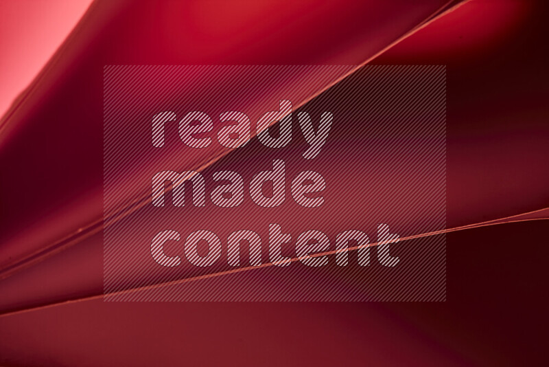 An abstract art piece displaying smooth curves in warm and cold gradients created by colored light