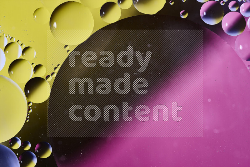 Close-ups of abstract oil bubbles on water surface in shades of yellow, pink and black