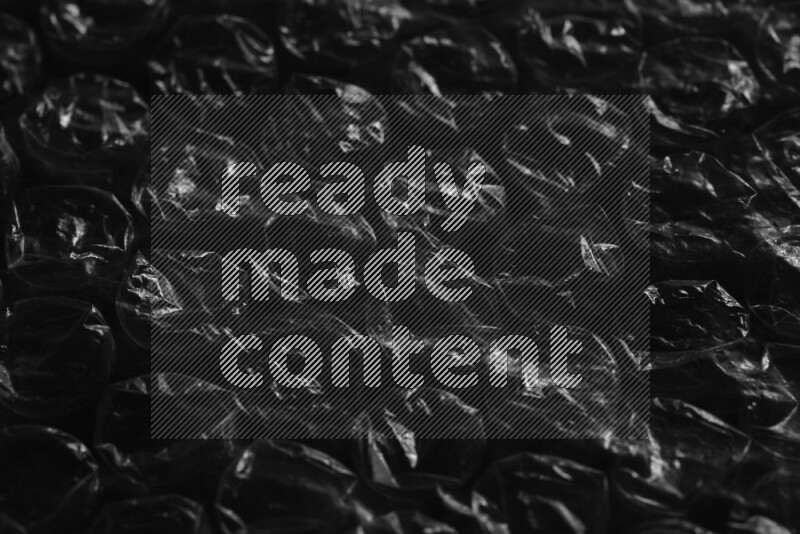 Bubble wrap texture on black background