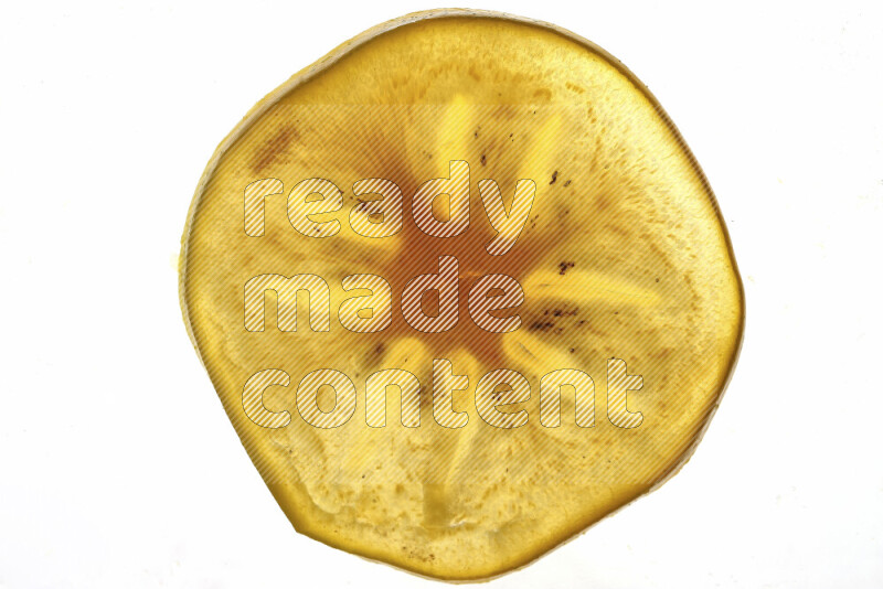 Persimmon slices on illuminated white background