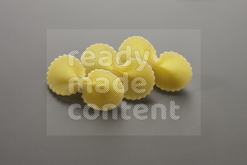 Fiocchi pasta on grey background