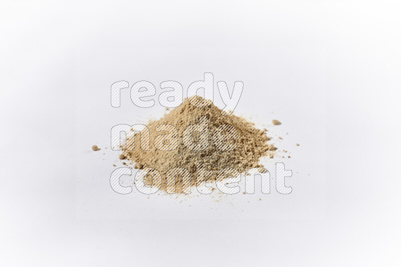 A bunch of ground ginger powder on white background