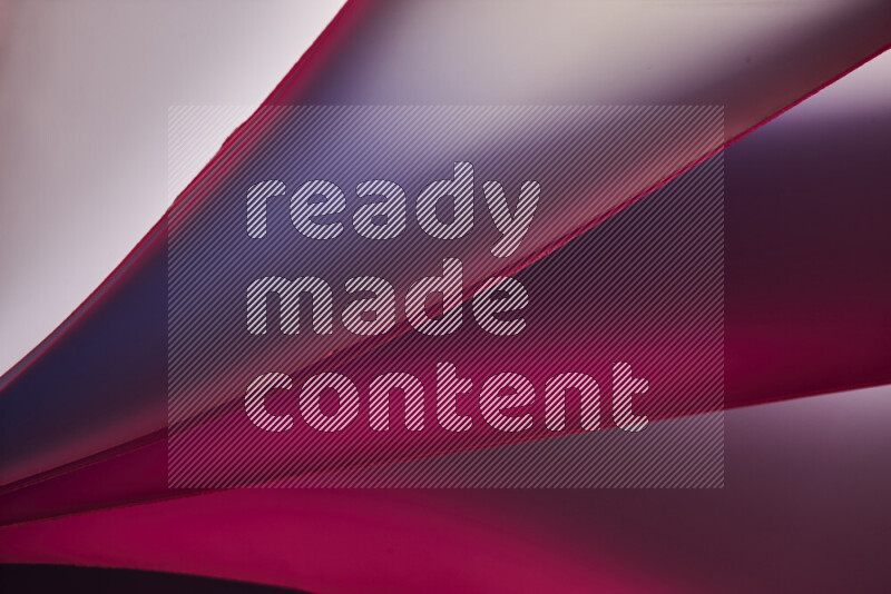 An abstract art piece displaying smooth curves in warm and cold gradients created by colored light