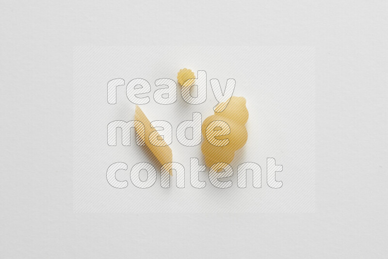 Different pasta types on white background