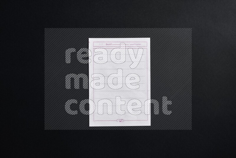 Notebook sheet on black background