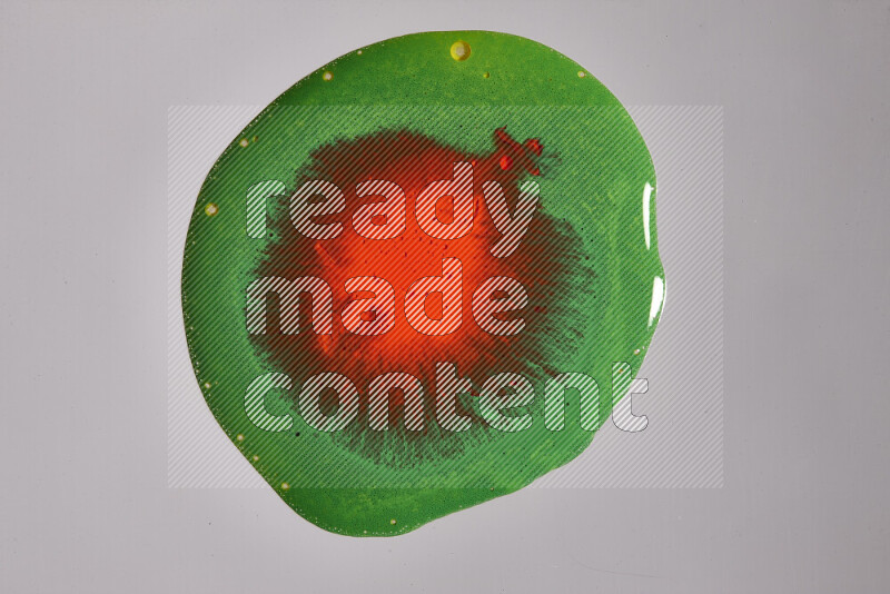 Close-ups of assorted colors blending on a grey background