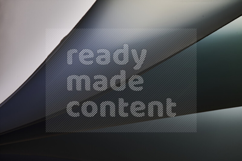 فن تجريدي يعرض منحنيات مع تدرجات الألوان الباردة مكونه بضوء ملون