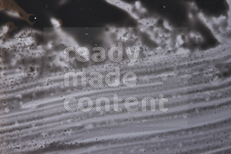 Close-ups of abstract black paint texture in different shapes