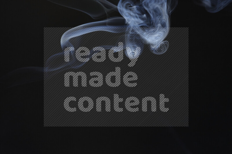 Motion of wavy smoke isolated on dark background