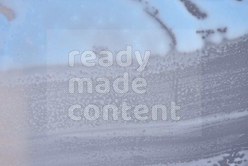 Close-ups of abstract blue paint texture in different shapes