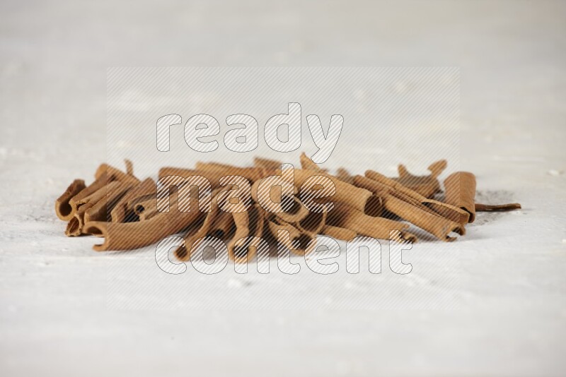 Cinnamon sticks in different angles on white background