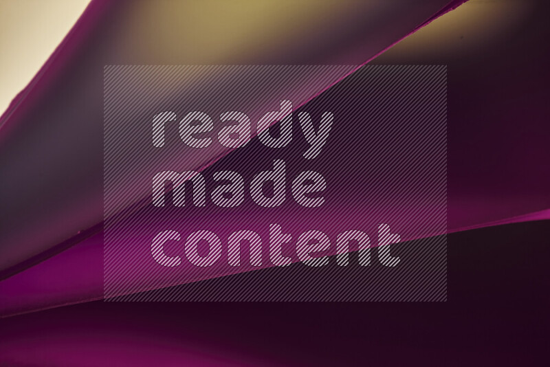 فن تجريدي يعرض منحنيات مع تدرجات الألوان الدافئة والباردة مكونه بضوء ملون