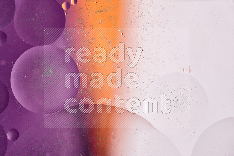 Close-ups of abstract oil bubbles on water surface in shades of white, orange and purple