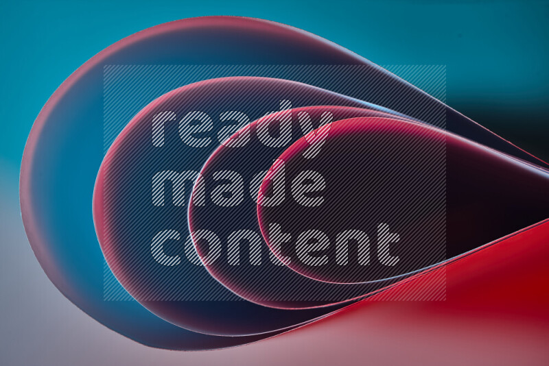 An abstract art of paper folded into smooth curves in blue and red gradients