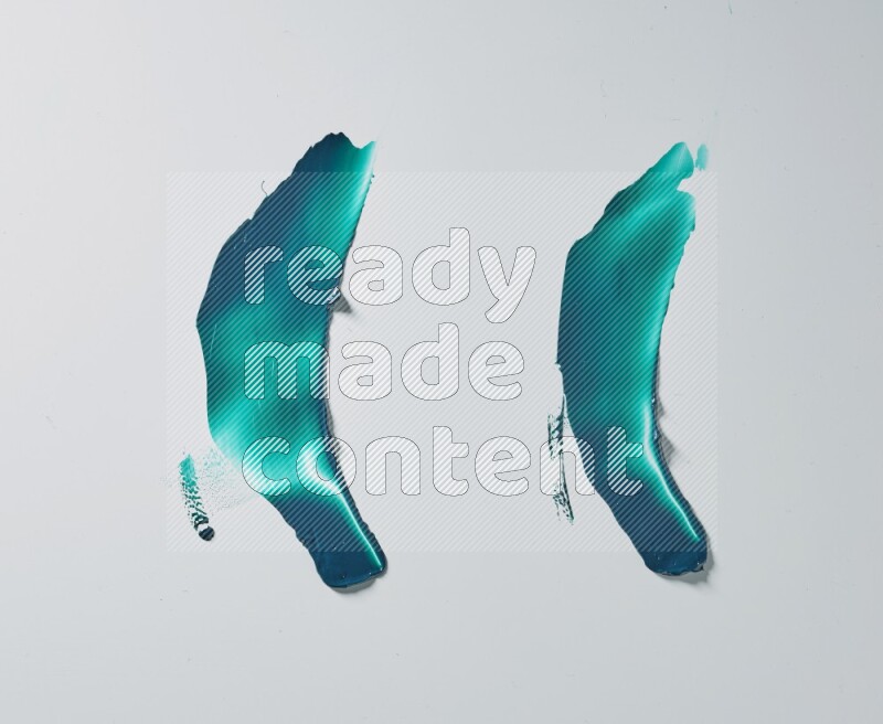 Turquoise curved painting knife strokes on white background