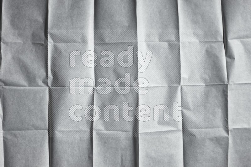 White paper sheet on black background