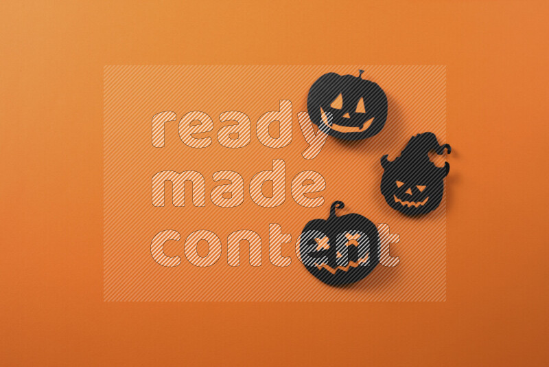 Halloween hand crafts on orange background