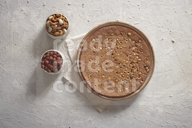 Basbousa with nuts in a light setup