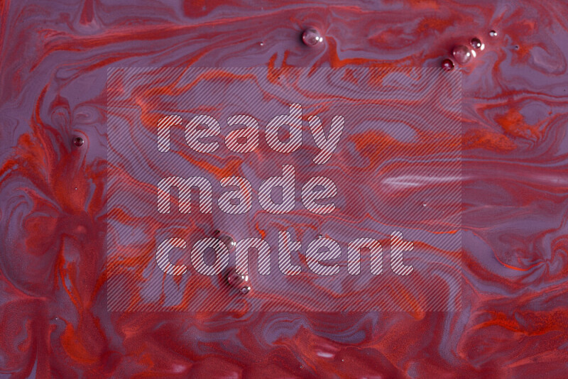 خلفية ملونة مع مزيج من ألوان الطلاء الأرجواني والأحمر