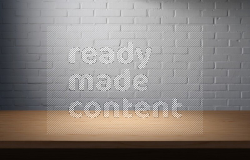 A wooden table top with colored brick wall background