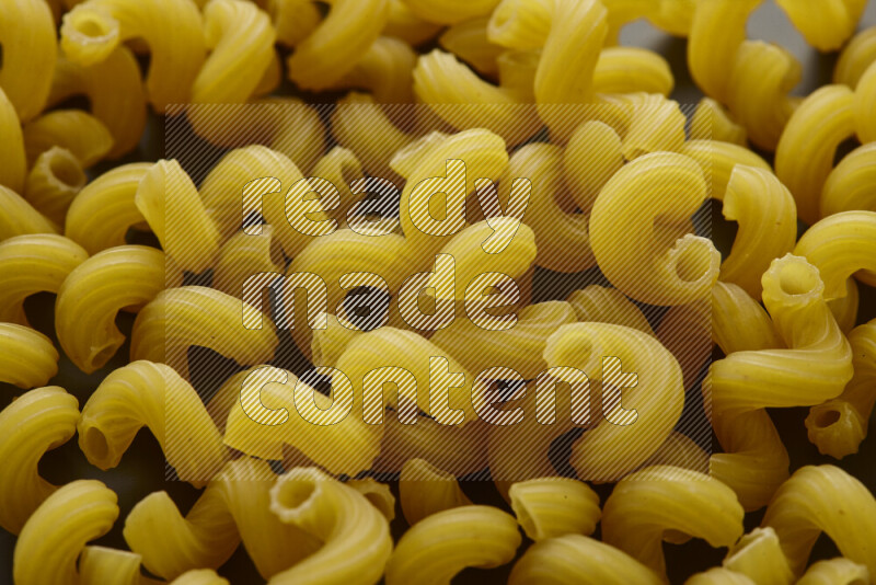Twist pasta on grey background